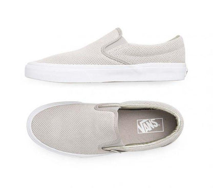 The Perforated Suede Classic Slip-On features low profile slip-on perforated suede uppers,, padded collars, elastic side accents, and signature rubber waffle outsoleVANS | CLASSIC SLIP-ON (PERFORATED SUEDE)123